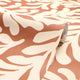 Coral Leaf Wallpaper in Cream on Terracotta