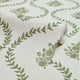 Posy Trellis Wallpaper in Pistachio on Cream