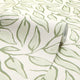 Scattered Leaf Wallpaper in Pistachio on Cream